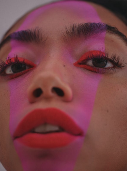 POC woman, red lips, pink make-up