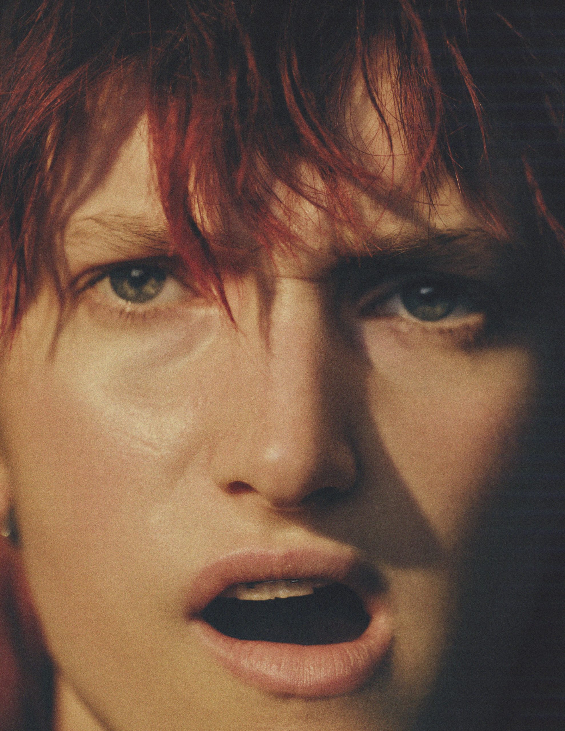 woman with open mound and red bangs