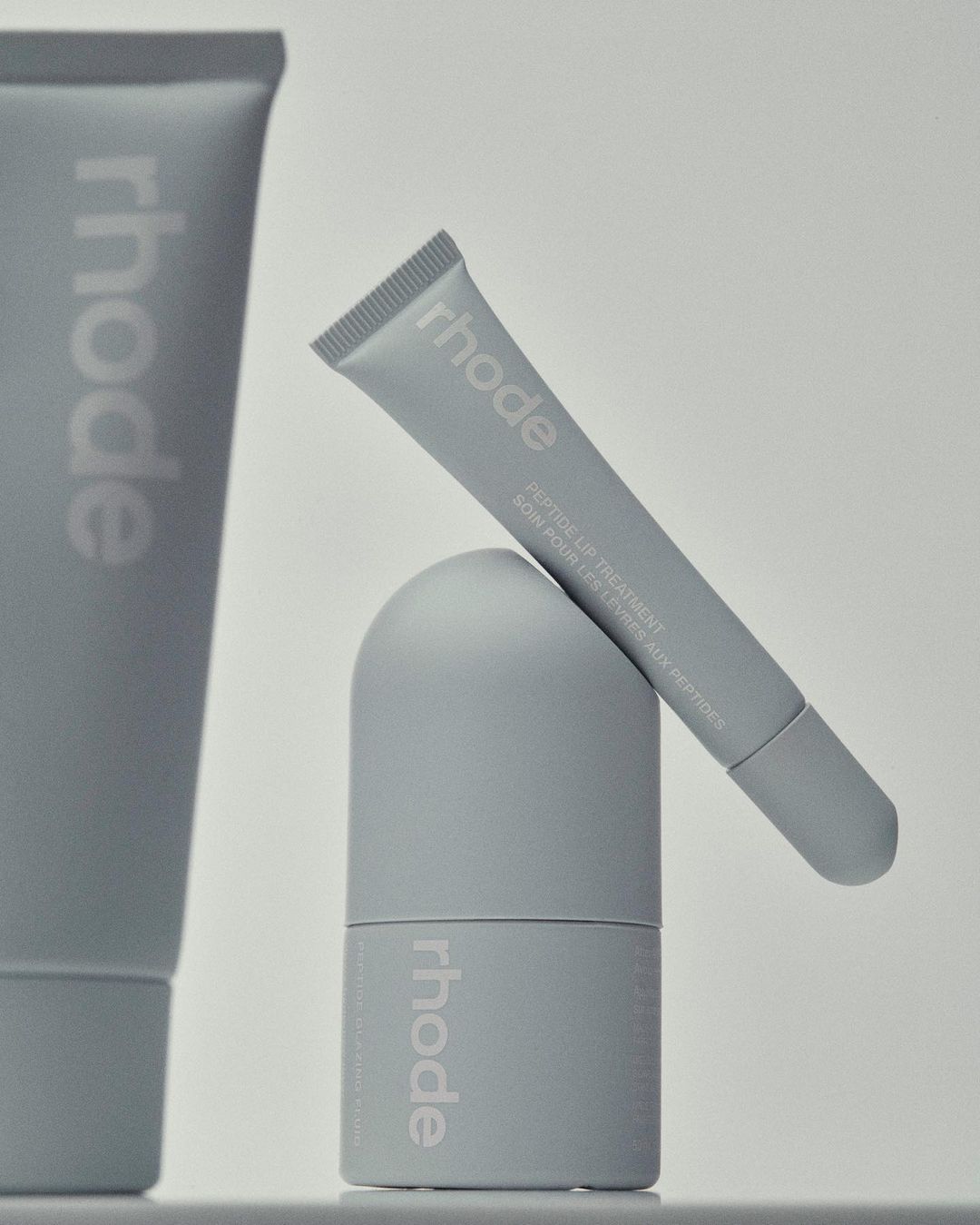 Skincare products in grey packaging